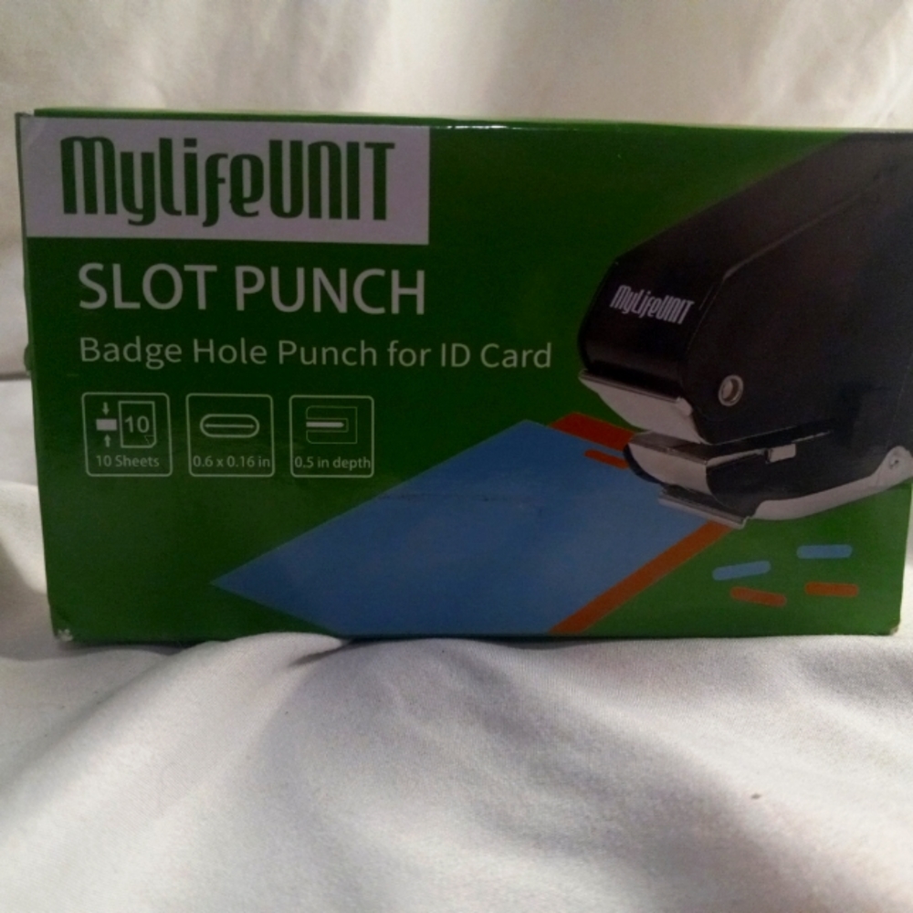 Badge hole punch